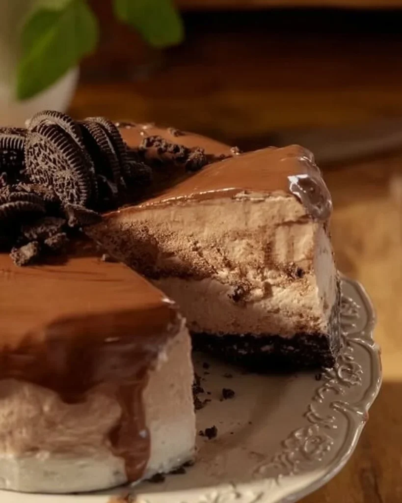 No bake Nutella cheesecake topped with chocolate and hazelnuts