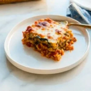 Delicious vegetable lasagna layered with fresh vegetables and cheese