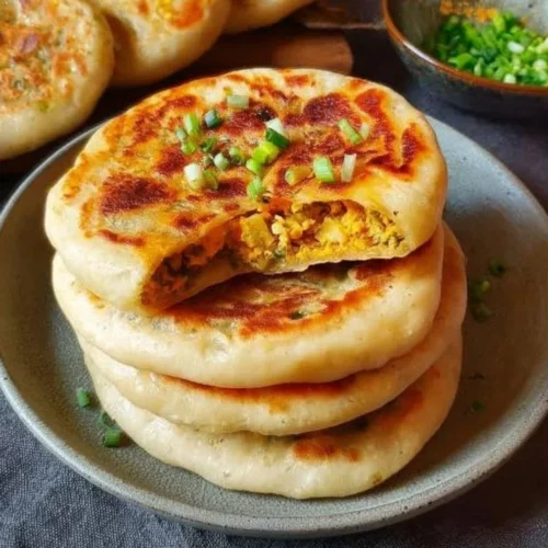 Chinese-style savoury stuffed breakfast pancakes on a plate