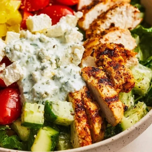 Healthy Greek Chicken Bowl with fresh vegetables and grilled chicken