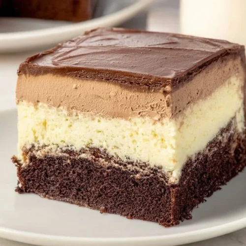 Delicious slice of Italian Love Cake with creamy frosting and decorative toppings