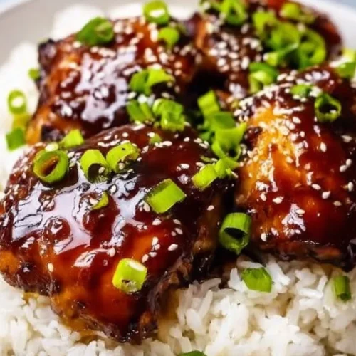 Slow Cooker Honey Garlic Chicken served with vegetables on a plate