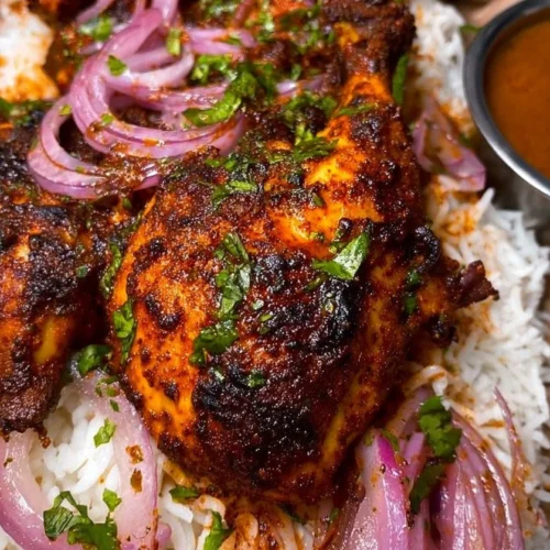 Marinated baked chicken ready to serve with herbs and spices