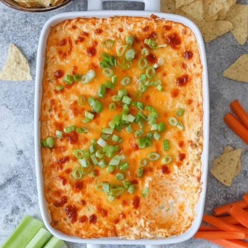 Cottage Cheese Buffalo Chicken Dip served in a bowl with tortilla chips