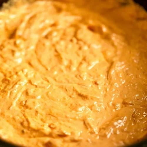 Delicious Crockpot Buffalo Chicken Dip served with tortilla chips