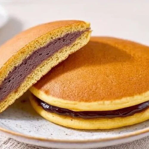 Delicious homemade Dorayaki pancakes filled with red bean paste.