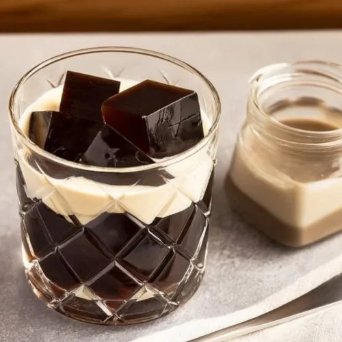 Delicious homemade Japanese coffee jelly dessert served in a glass.