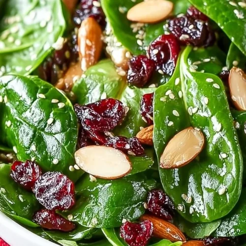 Festive Christmas Cranberry Spinach Salad with vibrant ingredients