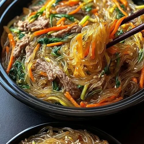 Delicious japchae made with sweet potato noodles and vibrant vegetables