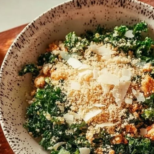 A vibrant Lemon Parm Kale Salad with fresh ingredients and lemon dressing.