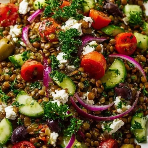 Colorful Mediterranean Lentil Salad with fresh vegetables and herbs