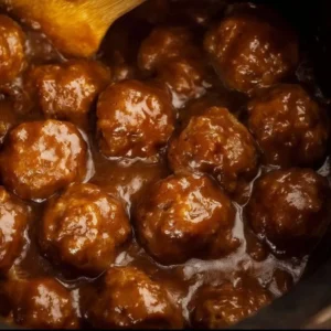 Slow Cooker Salisbury Steak Meatballs served with gravy and mashed potatoes