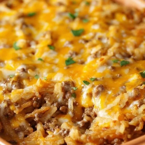 Delicious Taco Hashbrown Casserole prepared in a crock pot