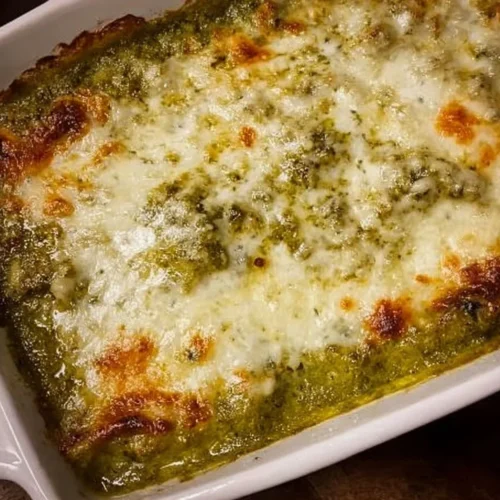 Delicious 3 Ingredient Baked Ravioli topped with cheese and herbs