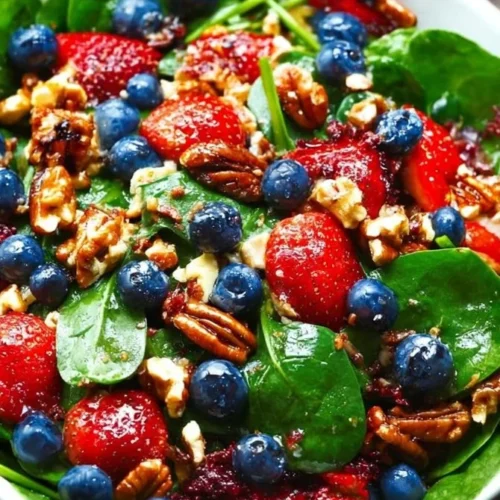 30-Minute Strawberry Spinach Salad with fresh strawberries and spinach leaves