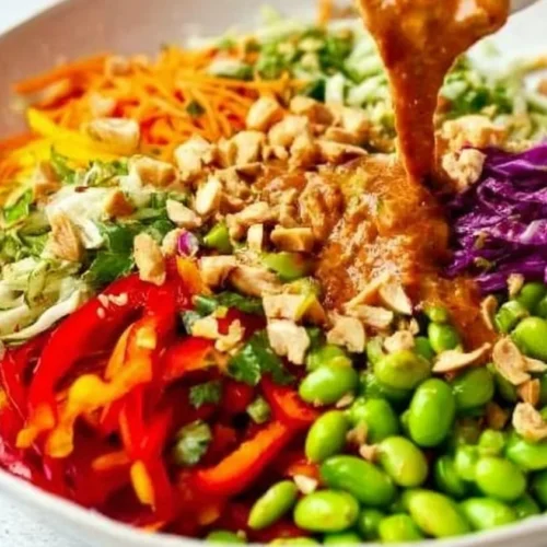 Delicious Asian Chicken Crunch Salad with colorful vegetables and chicken toppings