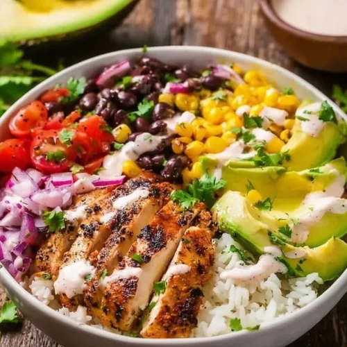 Delicious Chicken Burrito Bowl with fresh vegetables and toppings