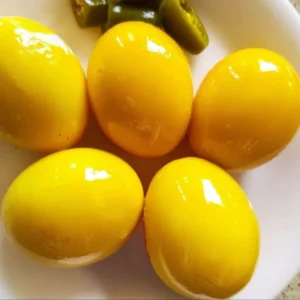 Delicious Cowboy Candy Pickled Eggs served on a plate