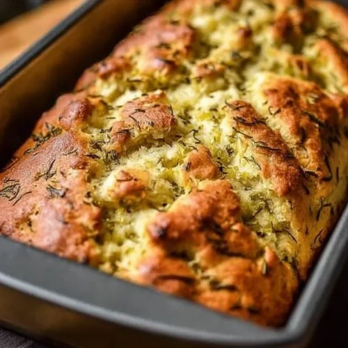 Homemade Dill Pickle Bread cooling on a wire rack