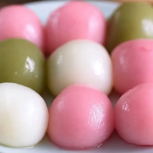 Colorful Easy Hanami Dango served on a stick for cherry blossom viewing.