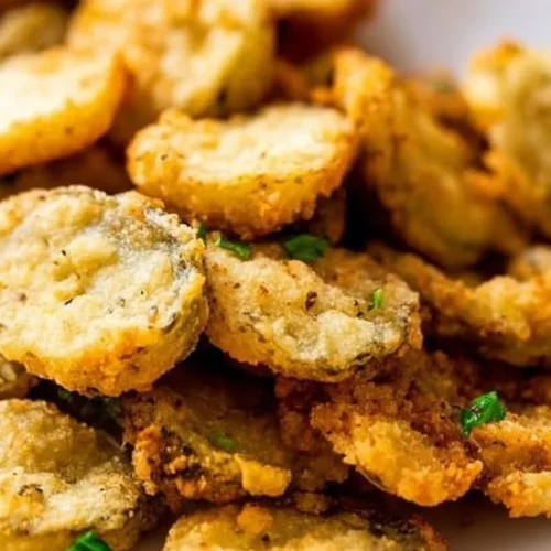 Delicious crispy fried pickles served with dipping sauce