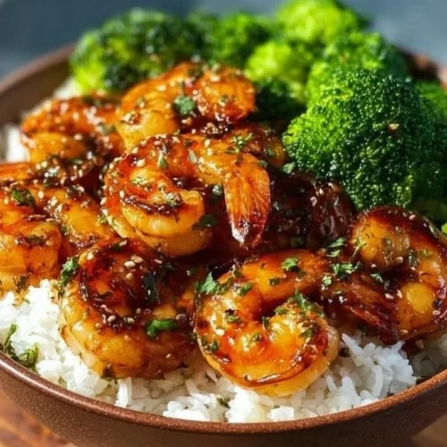 Delicious bowl featuring Honey Garlic Shrimp with rice and vegetables