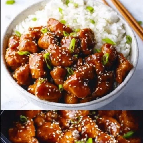 Plate of Instant Pot Sesame Chicken with sesame seeds and green onions.