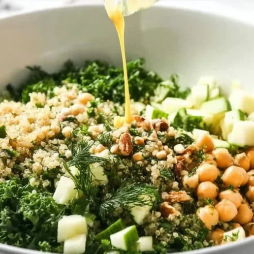 Healthy Kale Quinoa Salad with Lemon Dressing in a bowl