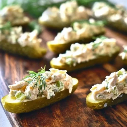 Low Carb Dill Chicken Salad served in pickle boats for a healthy meal