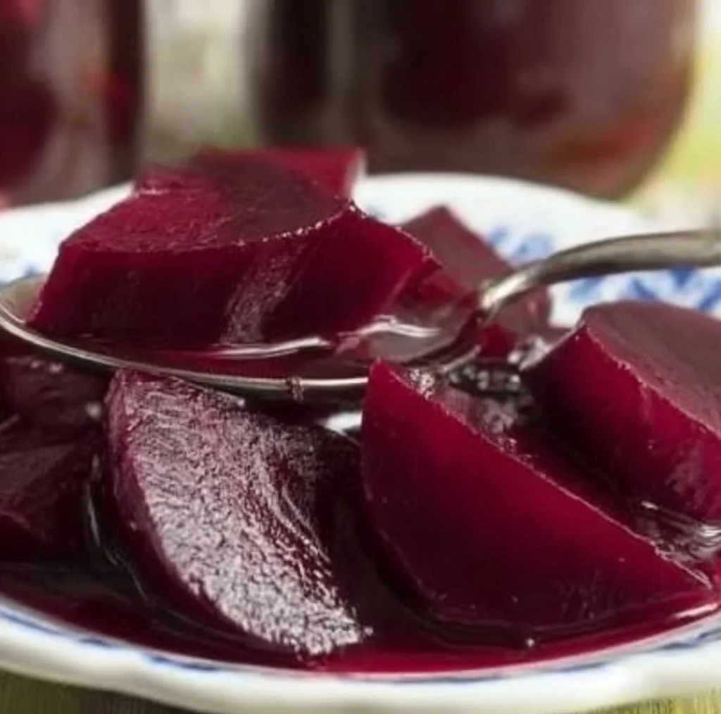 Jar of old fashioned pickled beets with vibrant color and homemade label