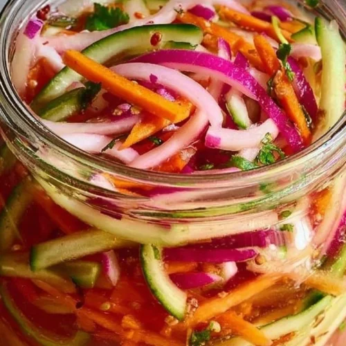 Assorted quick fridge pickled vegetables in jars for preservation