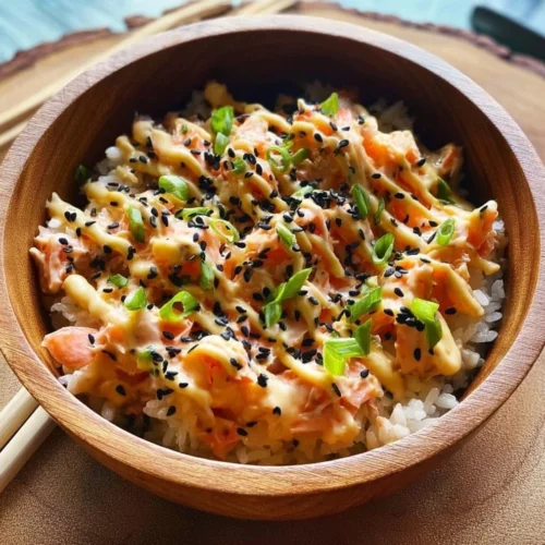 Spicy crab sushi bowl with fresh ingredients and vibrant presentation