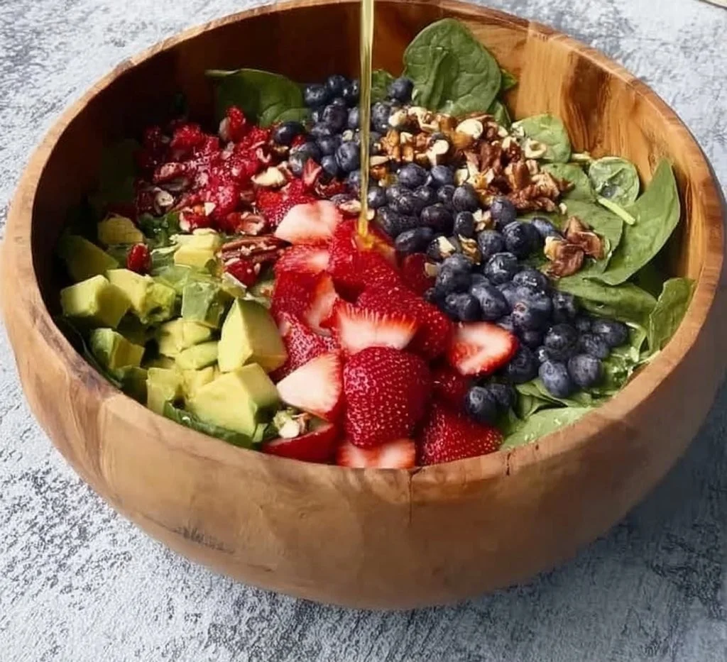 Colorful anti-inflammatory spring salad with fresh vegetables and herbs