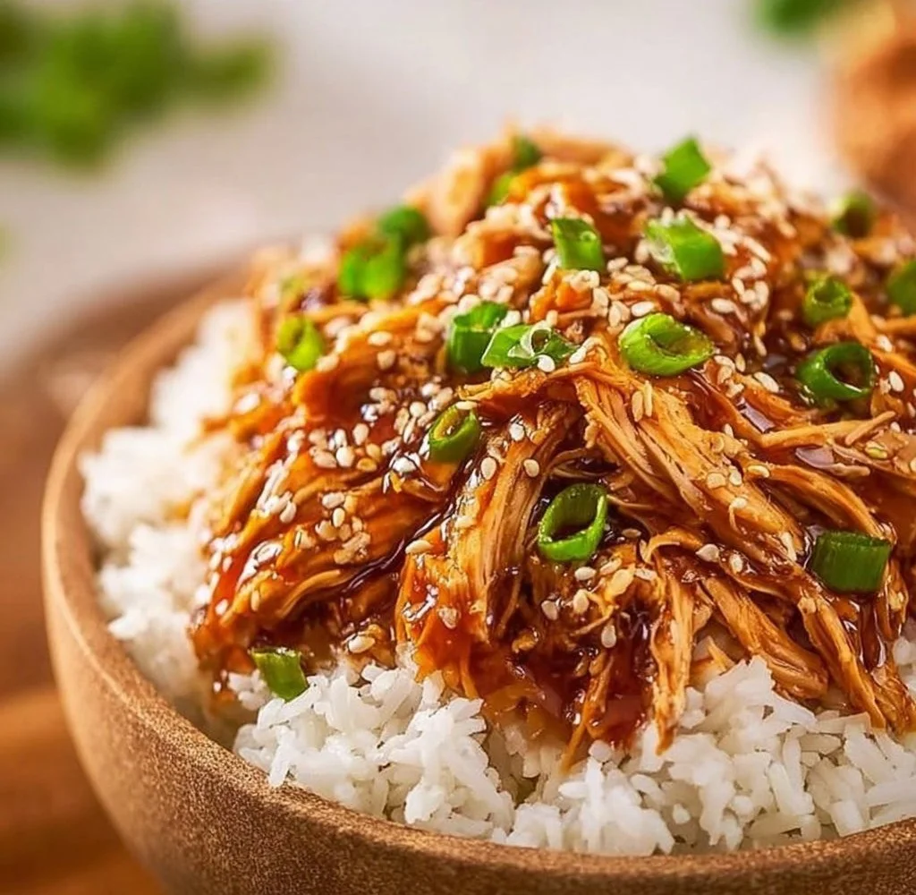 Delicious Asian Crock Pot Teriyaki Chicken served with rice and vegetables