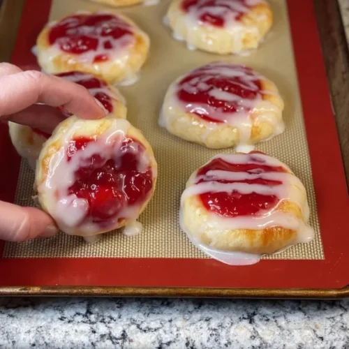 Delicious Cherry Cheesecake Danish garnished with fresh cherries