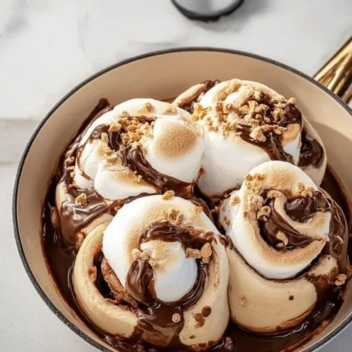 Delicious homemade gooey S'mores Rolls served on a plate