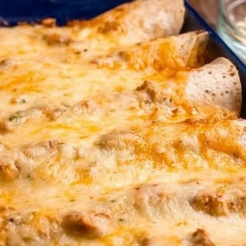 Delicious low carb white chicken enchiladas served on a plate
