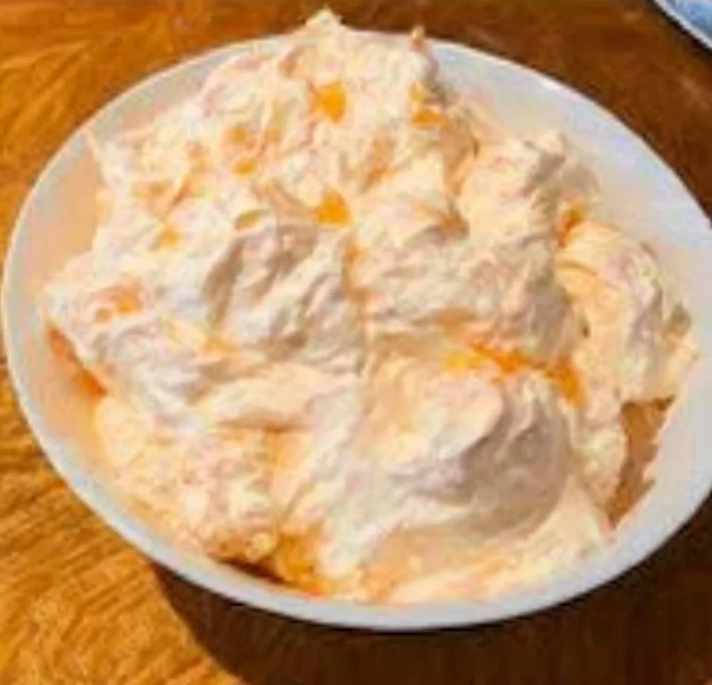 Delicious Mandarin Orange Jello Salad served in a bowl