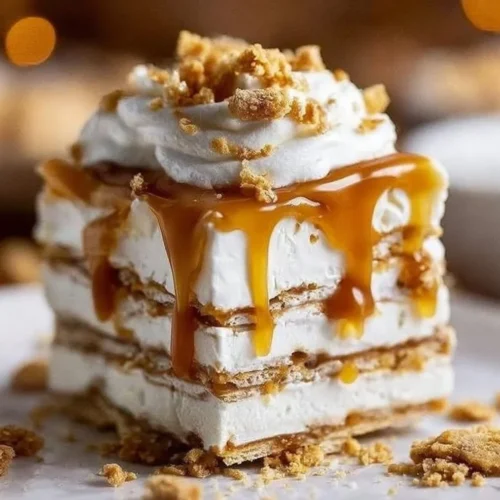 Ritz Cracker Salted Caramel Icebox Cake dessert with layers of cream and caramel.