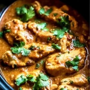 Slow Cooker Thai Peanut Chicken served with fresh vegetables