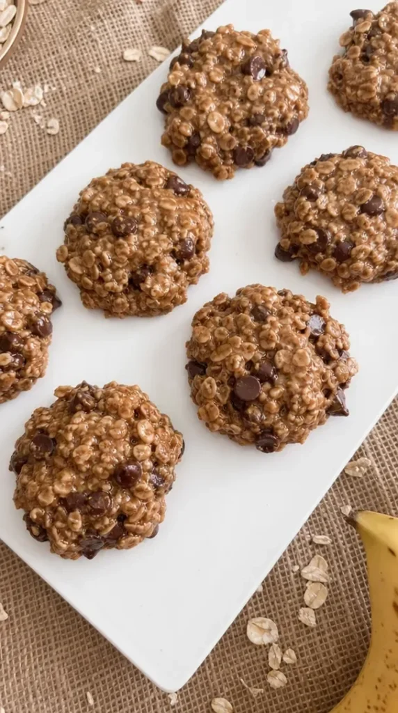 Easy banana oat cookies fresh out of the oven on a cooling rack